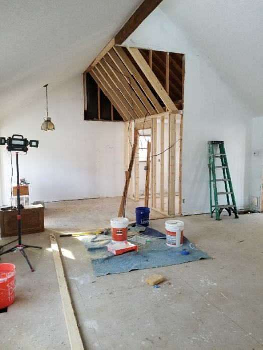 Knocked down a wall to open up the dining room. Bonus: vaulted ceilings for the win.